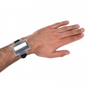 Optically-stimulated luminescent personal dosimeter InLight LANDAUER, Inlight dosimeter on hand Optically-stimulated luminescent personal dosimeter InLight LANDAUER, Inlight dosimeter on hand